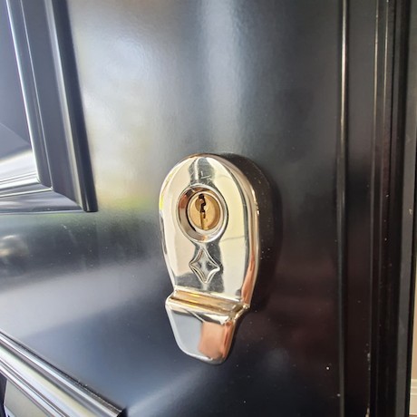 A front door lock replaced and repaired
