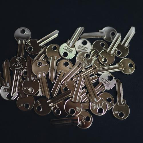Blank keys on a table ready to be cut for customer