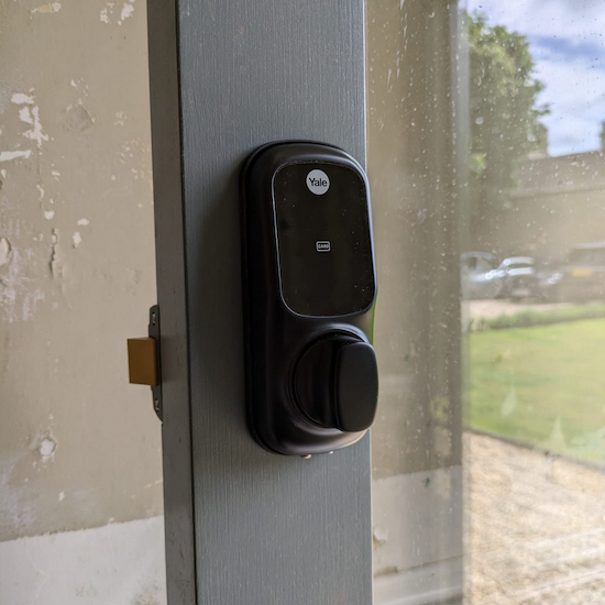 Yale smart digital door lock installed on front door.
